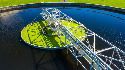Sewage treatment plant from above. Grey water recycling. Waste management theme. Ecology and environment in European Union.	 - obrazy, fototapety, plakaty