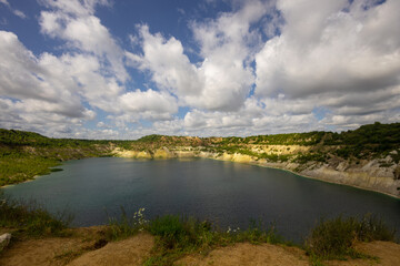 Fototapeta na wymiar Landscape with water in a chalk quarry