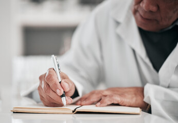 Scientist, writing and planning in notebook for healthcare research, data analysis and goals....