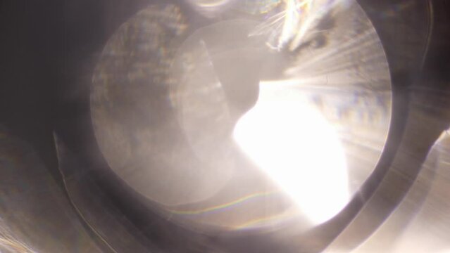 Mobility and bokeh add depth and harmony to transitional shots. The reflection of light on the object creates atmosphere and mood video editing. Video transition and footage for editing and editing