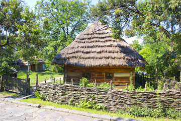 Fototapeta na wymiar Wooden house in Zakarpattia Skansen Museum of Folk Architecture and Customs in Uzhhorod, Ukraine