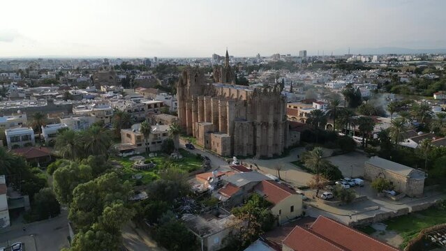 Aerial view of impressive gothic cathedral turned into a mosque (Lala Mustafa Pasa Camii) in old town of Famagusta in Northern Cyprus
