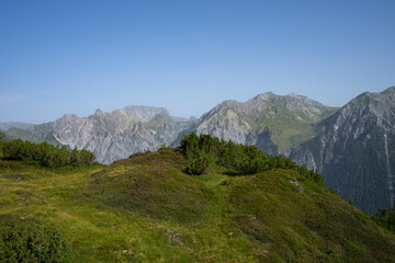 Obraz premium mountain landscape with view on alpine summits and blue sky