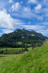 Fototapeta na wymiar landscape with mountains, clouds and blue sky