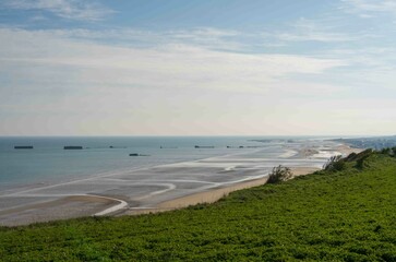 Fototapeta na wymiar Mulberry Harbour at Arromanches and Omaha Beach, Normandy, France