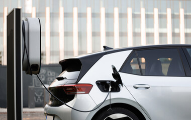 Charge station for electric cars. Electric car charger. Alternative energy for ecological cars....
