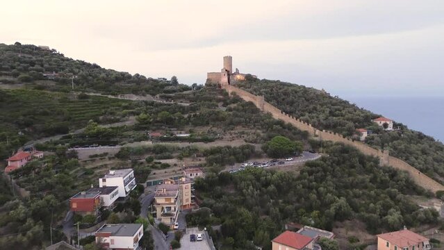 a view from above of the Ursiono castle atop the Noli hills