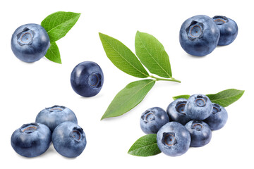Set with fresh ripe blueberries and green leaves isolated in white