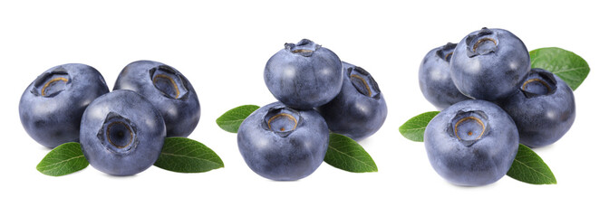 Set with fresh blueberries and green leaves isolated on white