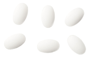 White pills isolated on white background, top view