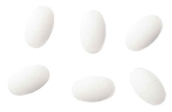 White pills isolated on white background, top view