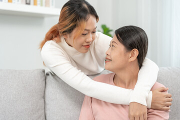 Mother day, cute asian teen girl hugging mature middle age mum. Love, kiss, care, happy smile enjoy family time. celebrate special occasion, happy birthday, merry Christmas. special day