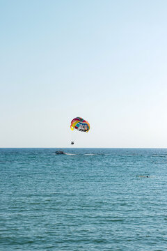 Colorful parachute with I LOVE CYPRUS text writing used for parasailing by boat off the Paphos harbour and port coast