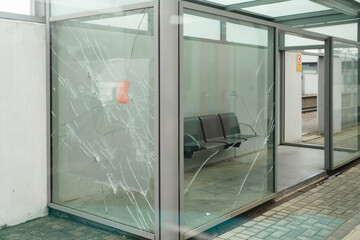 Broken glasses after vandalism to the glass cabinet used in public transportation