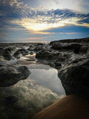 Fototapeta premium low tide and sunset at the mud beach in Malaysia