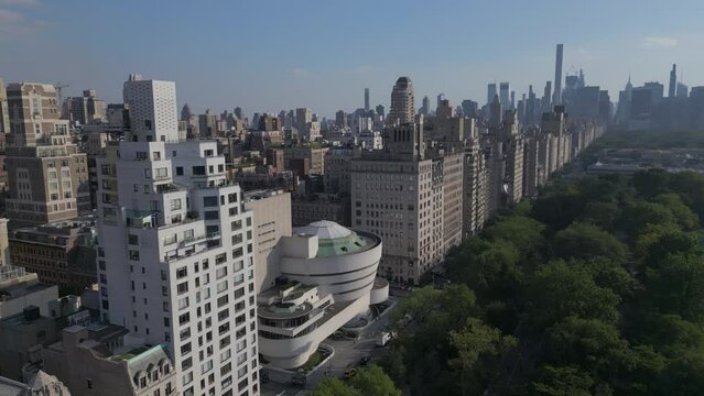 alt flying clockwise reveal of Central Park on Upper East Side of NYC