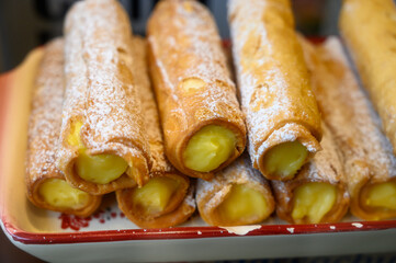 Fresh baked pastries and sweets on display in artisan Spanish confectionery shop