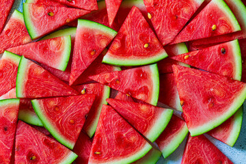 Red watermelon,a pile of freshly sliced watermelon textured background 