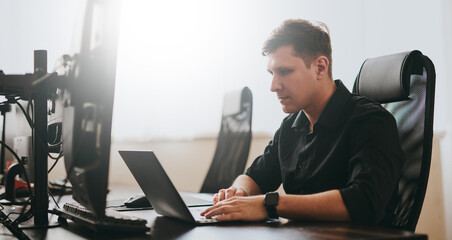 Portrait professional man programmer working concentrated on computer diverse offices. Modern IT...