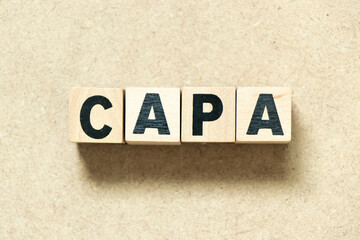 Alphabet letter block in word CAPA (abbreviation of corrective action and preventive action) on...