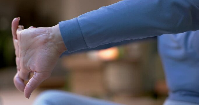 Stretching hands, yoga or woman in training for zen peace, flexibility or body mobility in home studio. Fingers closeup, pilates or healthy girl in exercise workout for spiritual wellness to relax