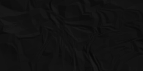 Dark crumple black paper wrinkled poster template ,blank glued creased paper texture background. black paper crumled backdrop background. used for cardboard and clarkboard.