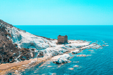 Punta Bianca, abandoned stone house on white cliffs in Sicily, Agrigento.