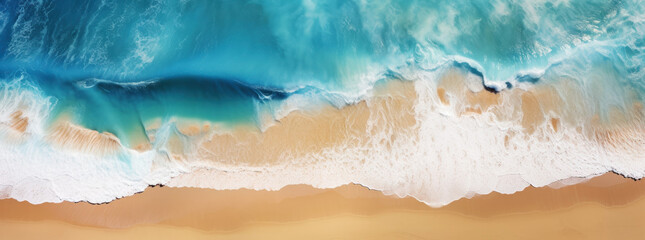 Tropical coastline with turquoise water waves washing the sandy beach. Top view