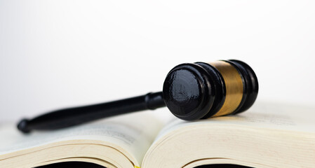 Justice and law concept. Judicial expertise wooden gavel on Law or Legal Book , Symbolizing Justice and Legal System. justice and law concept,legal, jurisprudence. wide view.