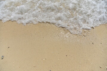 Abstract sandy beach and soft wave background Concept of traveling in Thailand, Phuket