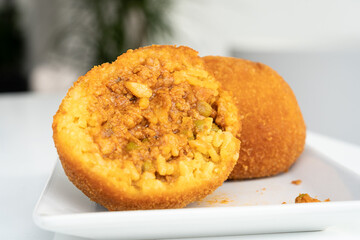 Fried rice ball. Arancino Arancina Arancini - Sicilian Street Food