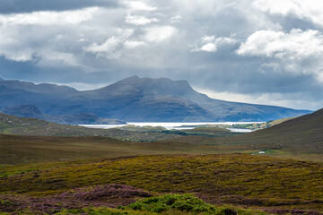 Fototapeta premium Great storm over the mountains forming a beautiful landscape in the Highlands, Scotland