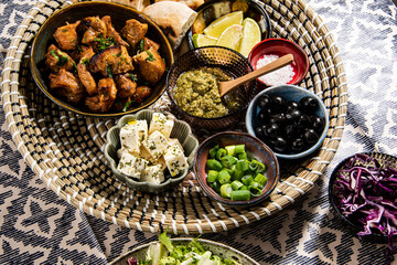 Appetizers food, cold dishes with roasted chiken. Colorful dishes