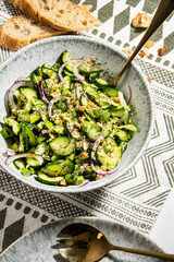 Cucumber salad with onion and seeds