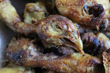 Fried chicken head in turmeric seasoning