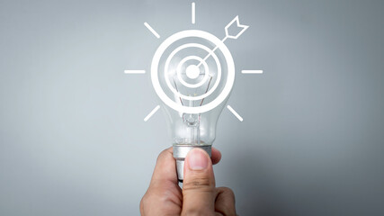 Light bulb idea creative with target objective achievement icon. Business strategy future...