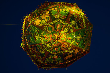 Colorful rajasthani umbrella hanging for decoration.