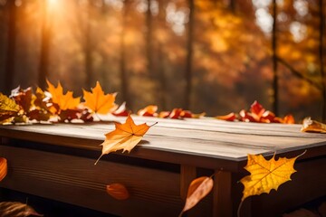 Empty wooden tabletop podium decorated with dry autumn leaves, blurred background of autumn plants 