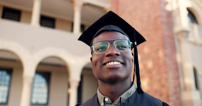 Graduation, black man and thinking of success, achievement and celebration at college event. Face of graduate with award for education, happy future and dream of learning, vision and pride at campus