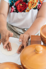 Obraz na płótnie Canvas hands making dough