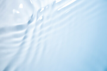 The surface of the water is clear, blue, soft and shiny.