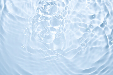 The surface of the water is clear, blue, soft and shiny.