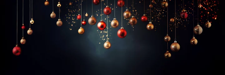 Deurstickers Many red and golden shiny Christmas baubles and ornaments hanging on black panoramic background with shiny golden lights, Christmas web banner © Delphotostock