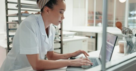 Chef, laptop and woman in restaurant kitchen typing on keyboard for healthy food idea and menu online. Computer, internet and person on website search video on nutrition information for lunch on pc
