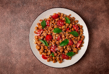 Tuscan pasta with smoked paprika and basil,parmesan cheese, Italian traditional cuisine,