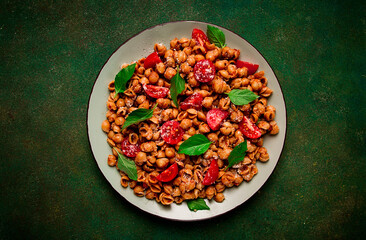 Tuscan pasta with smoked paprika and basil,parmesan cheese, Italian traditional cuisine,