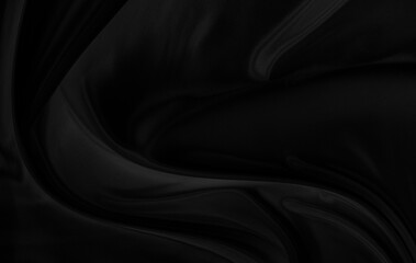 Black gray satin dark fabric texture luxurious shiny that is abstract silk cloth background with patterns soft waves blur beautiful.