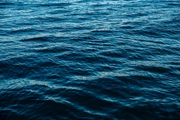 Fotobehang Abstract background. The surface of the blue Adriatic Sea. © Svetlana Zibrova