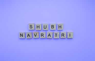October 15-24, shubh Navratri, a minimalistic banner with an inscription in wooden letters