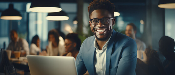 African happy businessman with team of professionals having a meeting in a digital marketing agency